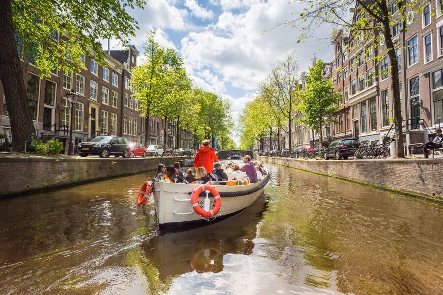 Amsterdam: Canal Belt Private Beer Boat Tour - The no-music rule changes the party atmosphere