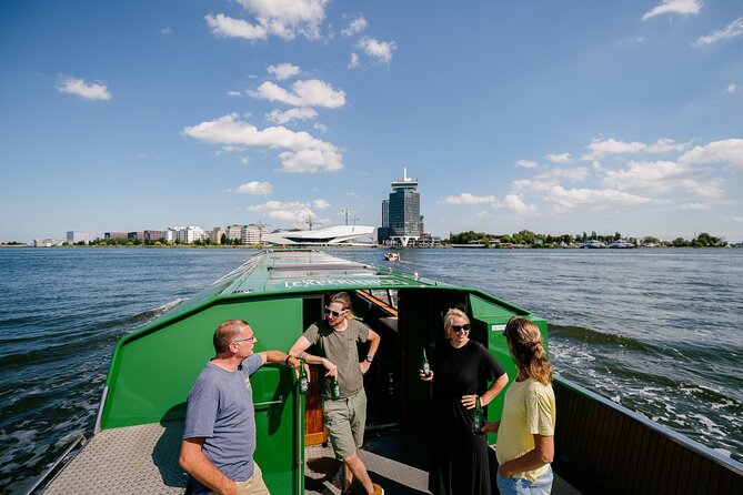 Amsterdam Heineken Cruise with 1 Heineken, Snacks, Live Guide - The drink, snacks, and live guide