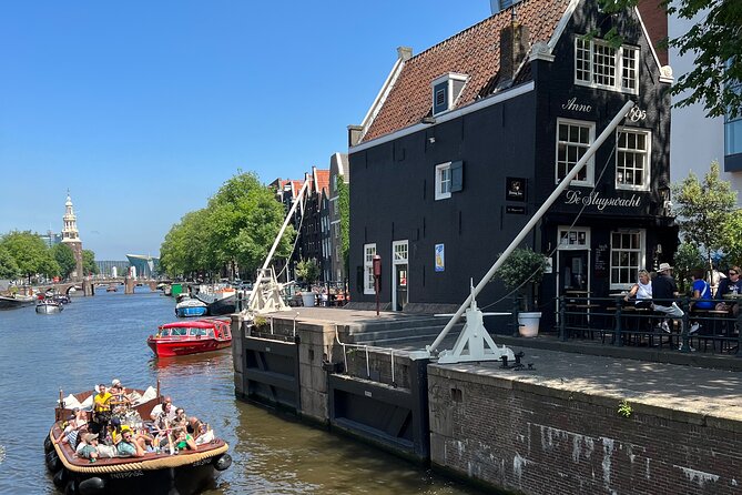 Amsterdam Luxury Boutique Boat tour with Unlimited Beer and Wine - Magere Brug and the final stretch