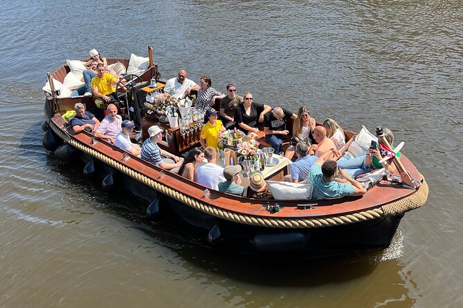 Amsterdam Luxury Boutique Boat tour with Unlimited Beer and Wine - Guide style and the better departures