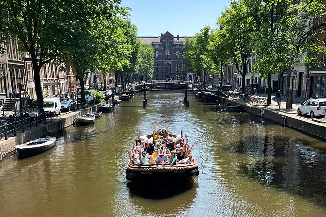 Amsterdam Luxury Boutique Boat tour with Unlimited Beer and Wine - De Wallen from the water