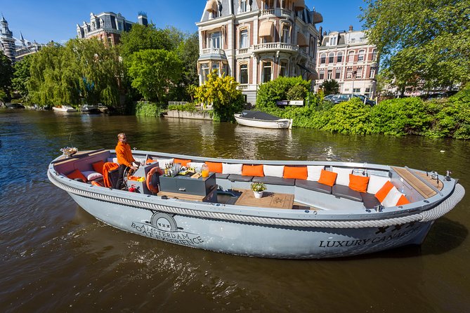 Amsterdam Private Boat Trip With Skipper, Burger and Beers - The grand canal belt and its best-known sights