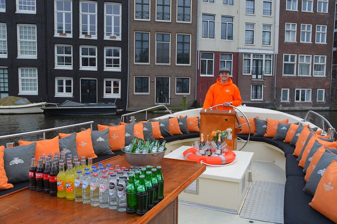 Amsterdam Private Boat Trip With Skipper, Burger and Beers - Amsterdam Central Station and the city’s older defenses