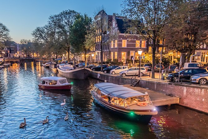 Amsterdam Small-Group Evening Canal Cruise Including Wine, Craft Beer, Cheese - The captain can shape the whole evening