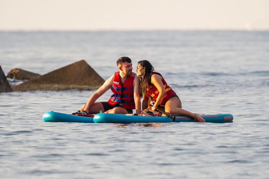 Barcelona: Sunset Paddleboarding Experience with 1 Beer - Timing, weather, and cancellation advice