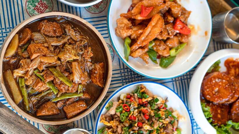 Beijing: Hidden Gems Guided Food Tour with Beer and Tastings - Copper-pot hotpot with a bell tower view
