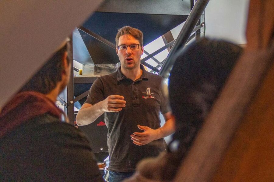 Bruges: History, Chocolate and Beer Walking Tour - Seeing how Belgian pralines are made