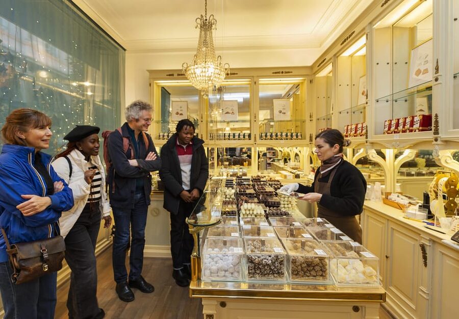 Brussels Food Tour: Main Dish, Beer, Waffle & Chocolate - Starting at Place Poelaert and entering the Marolles