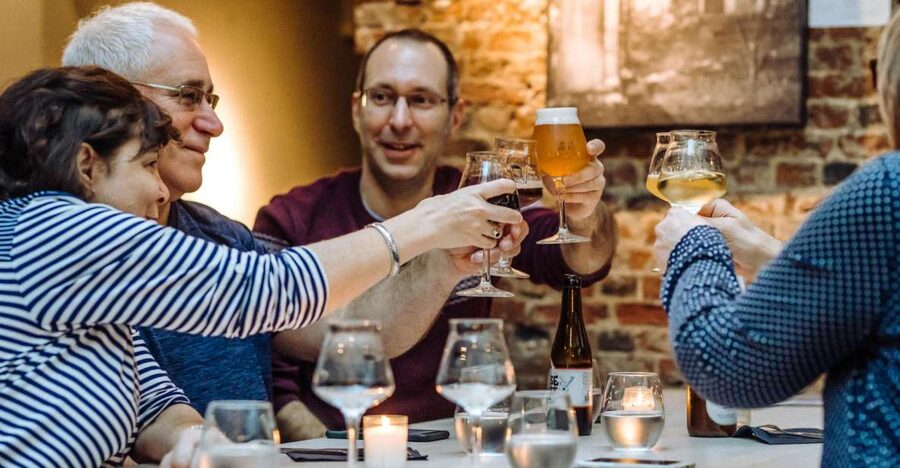 Brussels: Private Beers, Bars, and Live Music Tour by Night - A pub stop at Poechenellekelder