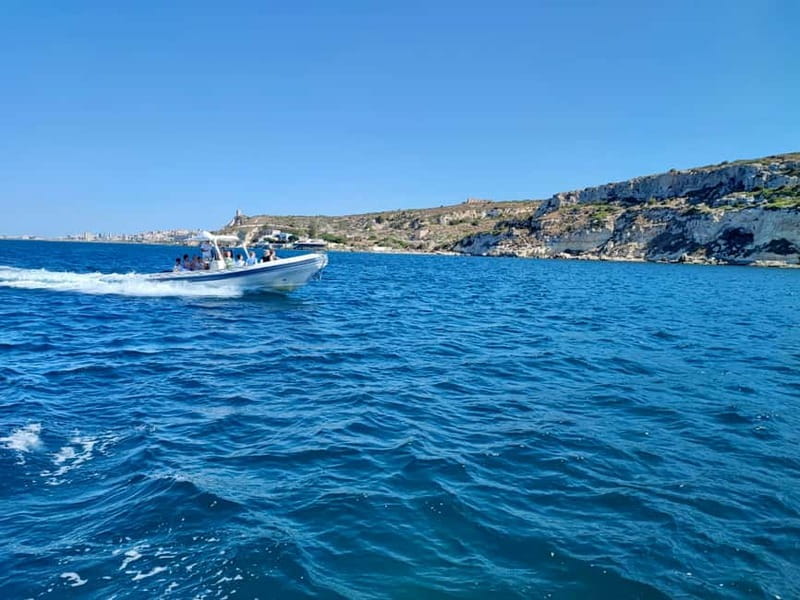 Cagliari: Boat Tour with Snorkeling, GoPro & Sardinian Beer - Devil’s Saddle from the water