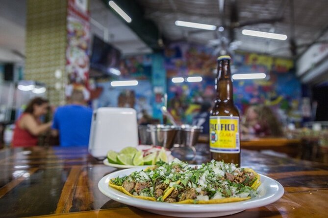 Cancun Taco & Beer Fiesta: Authentic Mexican Tasting Experience - Mariachi music and Mexican games add a social touch