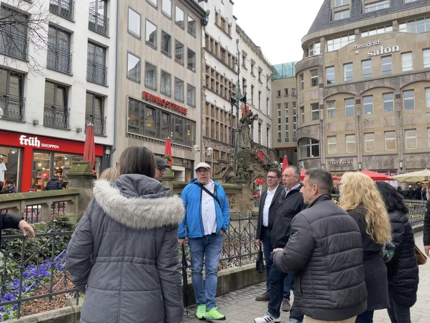 Cologne: 3 Old Town Breweries Guided Walking Tour - Starting beneath the Heinzelmännchenbrunnen