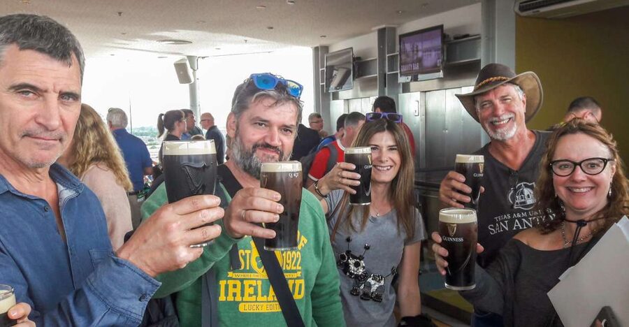 Dublin: Skip-the-Line Guinness and Jameson Whiskey Tour - Walking through Dublin and stopping at the Brazen Head