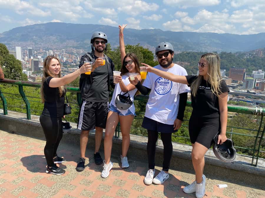E-Bike City Tour Medellin with Local beer and Snacks - Starting at San Joaquin Church