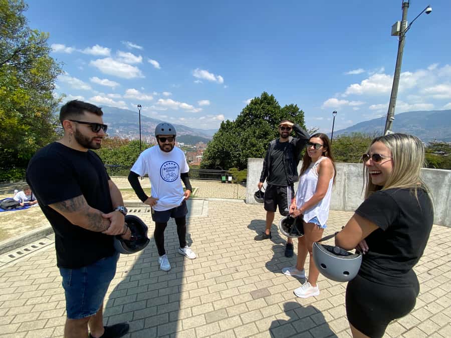 E-Bike City Tour Medellin with Local beer and Snacks - Conquistadores and Medellin’s everyday movement