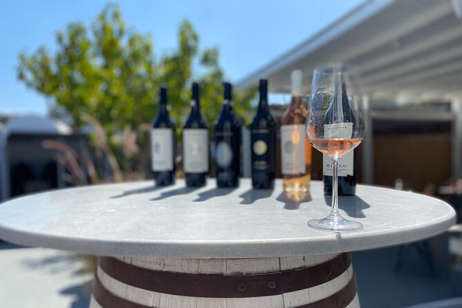 Explore Wine in Santorini Wine tasting in 3 wineries and brewery - Santorini wine starts with volcanic soil