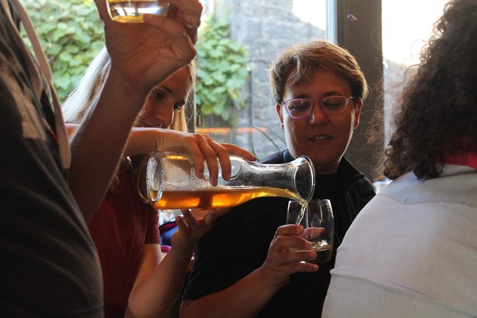 Glasgow: Pubs & History Walking Tour with Beer Tasting - Walking through Merchant City