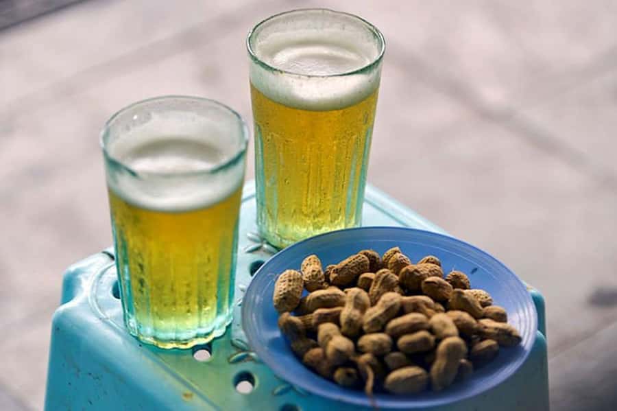 Hanoi Local Fresh Beer and Culinary Tour with Train Street - Fresh beer, roasted peanuts, and Hanoi drinking culture