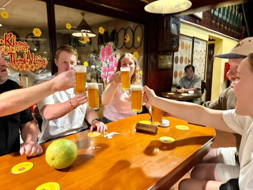 Ho Chi Minh City: Craft Beer and Local Food Tour by Scooter - Riding pillion through the city after dark