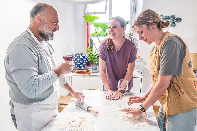 Italian Cooking Class in Rome near Vatican City with Ale & Larry - Rolling Fettuccine or Tagliatelle by Hand