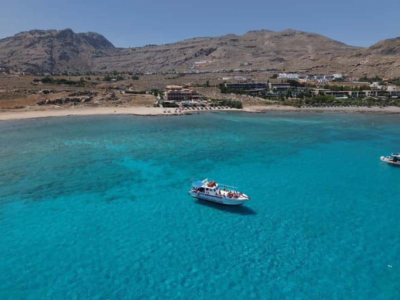 Lindos: Sunset Cruise with Unlimited Aperol, Beers & Wine - Sailing toward Lindos and St Paul’s Bay