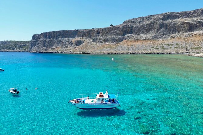 Lindos Sunset Cruise with Unlimited Aperol Spritz, Beer & Wine - Sunset behind the Acropolis of Lindos