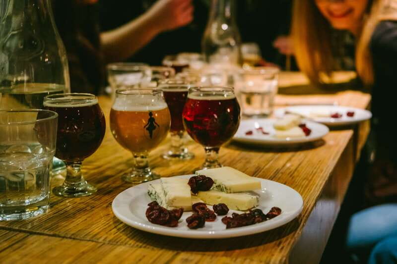 Montreal Old Port: Craft Brewery and Beer Tasting Tour - Walking through Old Montreal between tastings