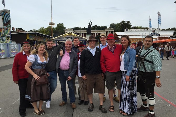 Oktoberfest Tour with table and unlimited beer - Walking through the Oktoberfest grounds