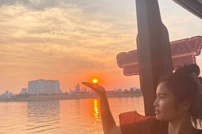 Phnom Penh: Sunset Cruise-Free Beers-Sodas-BBQ Buffet-fruit plate - Leaving Koh Pich Island for the Mekong