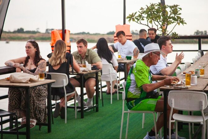 Phnom Penh: Sunset Cruise- Free Cold Beers, Sodas & fruit platter - The human side of the evening