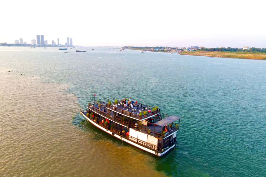 Phnom Penh: Sunset Cruise with Unlimited Beer &Fruit platter - The Four Faces River junction