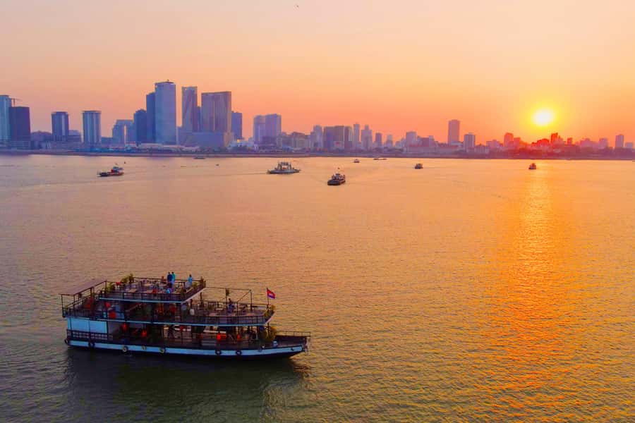 Phnom Penh: Sunset Cruise with Unlimited Beer &Fruit platter - From hotel lobby to the boat