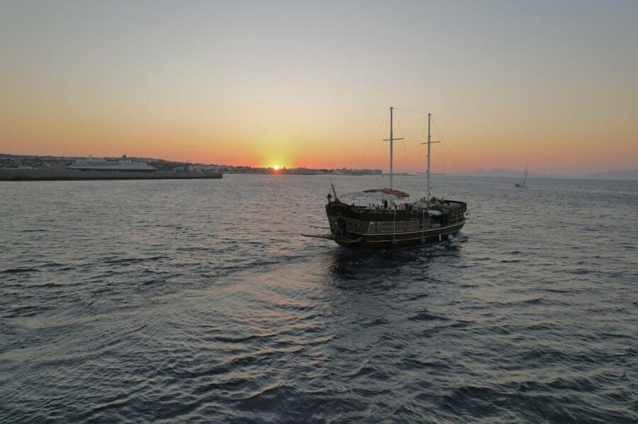 Rhodes: Sunset Cruise with Unlimited Aperol, Beer, and Wine - Leaving Mandraki Harbour in the late afternoon