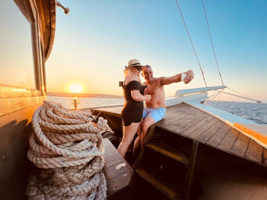 Rhodes: Sunset Cruise with Unlimited Aperol, Beer, and Wine - Watching the sun disappear over western Rhodes