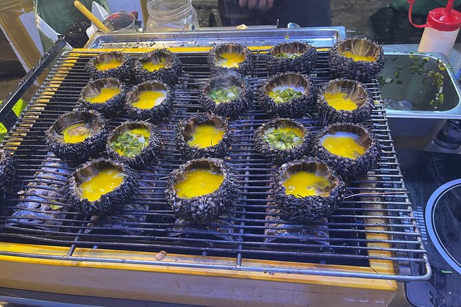 Saigon Night Craft Beer and Street Food By Scooter and motorbike - Stop four: Frozen Beer, local dishes, and the longest meal
