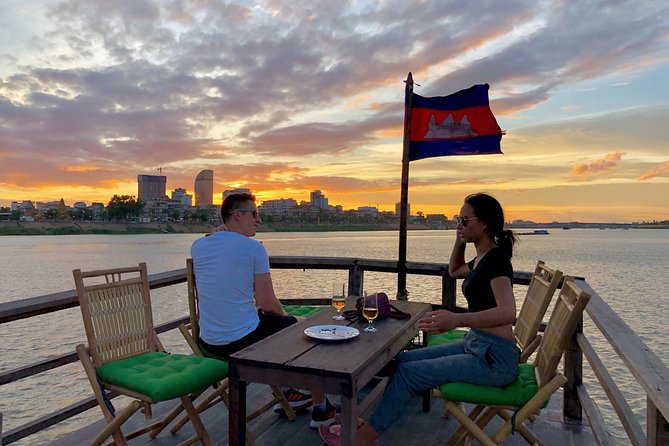 Sunset Cruise with unlimited beer & soft drinks -English speaking guide on board - A sunset view of Phnom Penh that feels different
