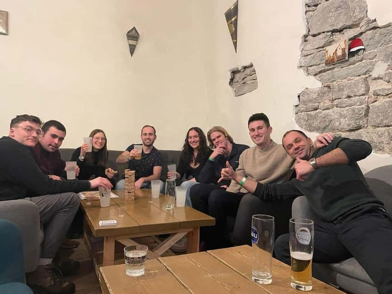 Tallinn: Bar Crawl with Shots, Beer, and Nightclub Entry - Walking to the first bar through Tallinn