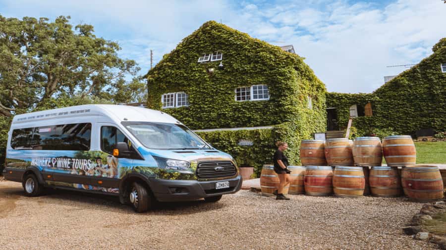 Waiheke: Scenic Taste and Graze Tour with Wine, Whisky, Beer - Vineyard lunch with a platter and a view